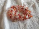 Multi-row bracelet in orange tones